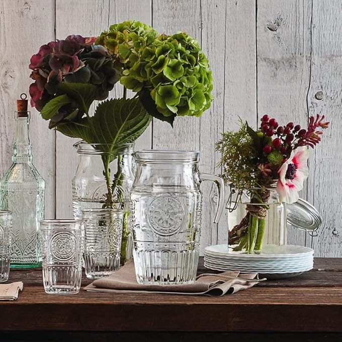 Bormioli 'Romantica' glass carafe with ice compartment, carafe filling capacity of 1.8 litres, keeps drinks cool without becoming watered down, glass embossing in a beautiful vintage design