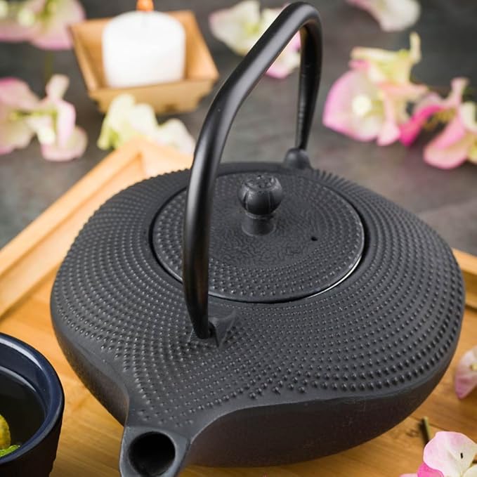 Restaurantware Tetsubin 34 Ounce Cast Iron Teapot 1 With Strainer Iron Teapot - Retains Heat Curved Handle Black Cast Iron Japanese Tea Kettle Hobnail