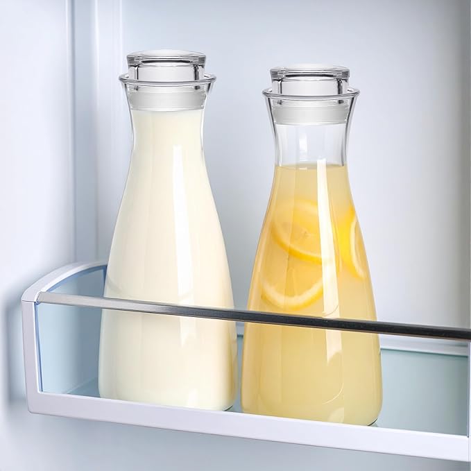 Amazing Abby - Cara - 4-Pack Acrylic Carafe (36 oz), Plastic Carafe with Lid, Fridge Jug, Round, Clear, BPA-Free, Shatter-Proof, Great for Iced Tea, Sangria, Lemonade, Juice, Milk, and More