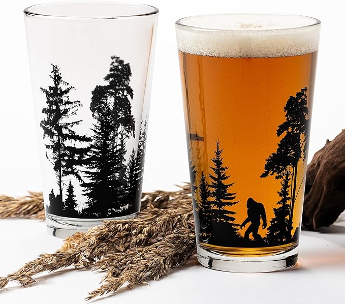 Pint Glasses by Black Lantern – Beer Glasses for Craft Beer Enthusiasts - Set of Two 16oz. Glasses - Bigfoot in the Forest Cocktail and Drinking Glasses - Bigfoot Lover Gifts